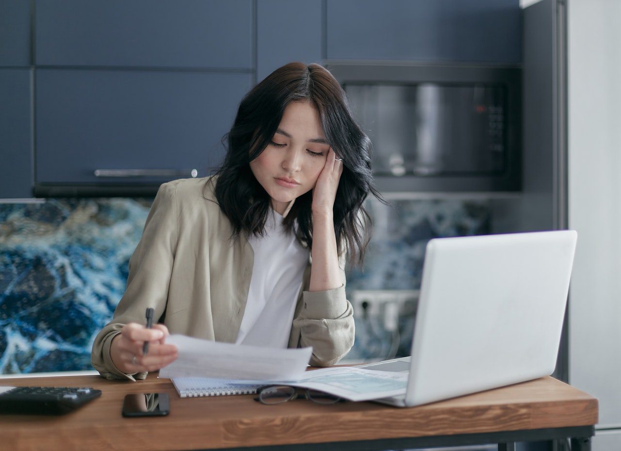 woman looking at document